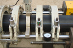 Step 4 — Push the pipes towards the heating plate and allow them to heat through.